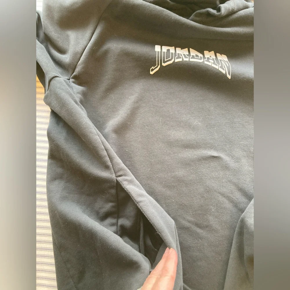 Jordan Men’s Black Hoodie with Teal Graphic and Front Pockets, Size Large